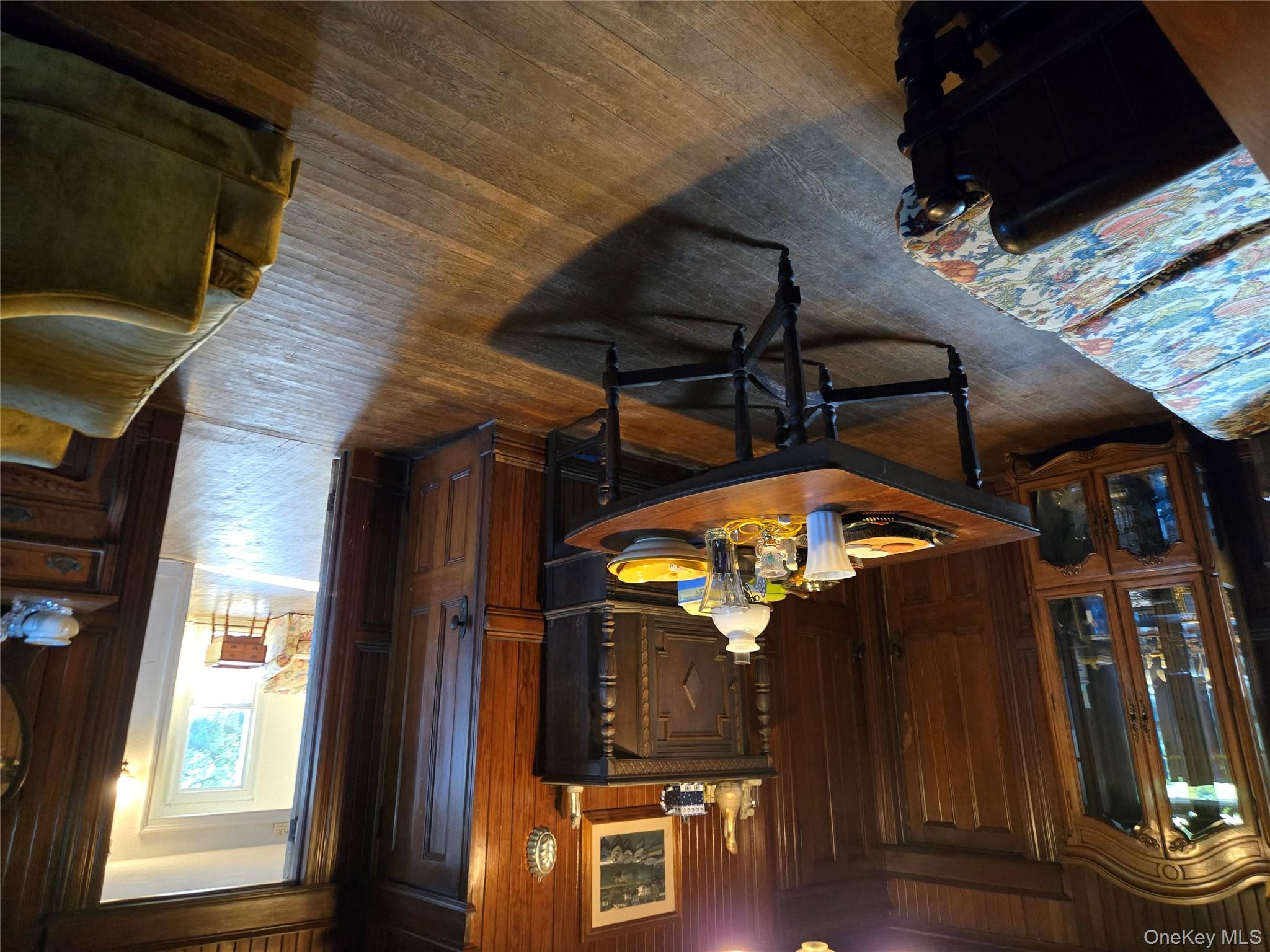 3953 Sound Avenue Riverhead, NY 11901 - Photo 9 of 14 a view of a dining room with furniture and wooden floor