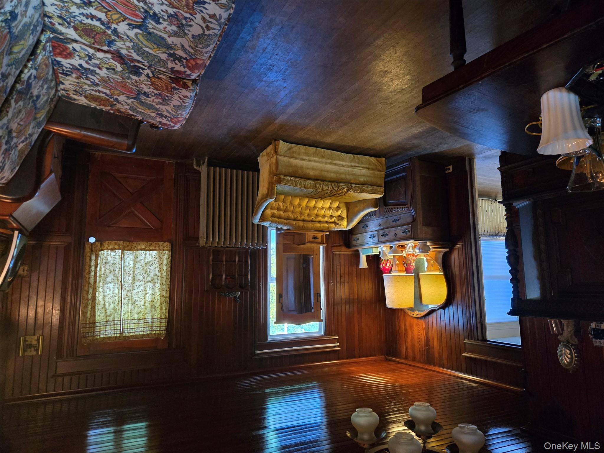3953 Sound Avenue Riverhead, NY 11901 - Photo 10 of 14 a living room with furniture and a flat screen tv