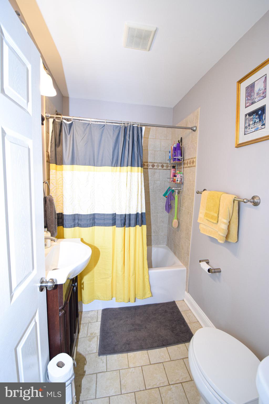 149 Post Road Aberdeen, MD 21001 - Photo 21 of 49 a bathroom with a sink a bathtub and a shower