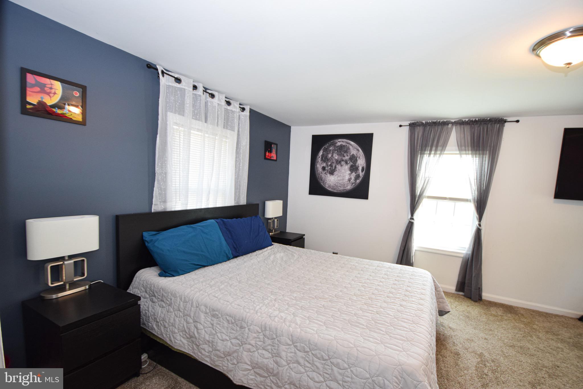 149 Post Road Aberdeen, MD 21001 - Photo 22 of 49 a bedroom with a bed and a flat screen tv