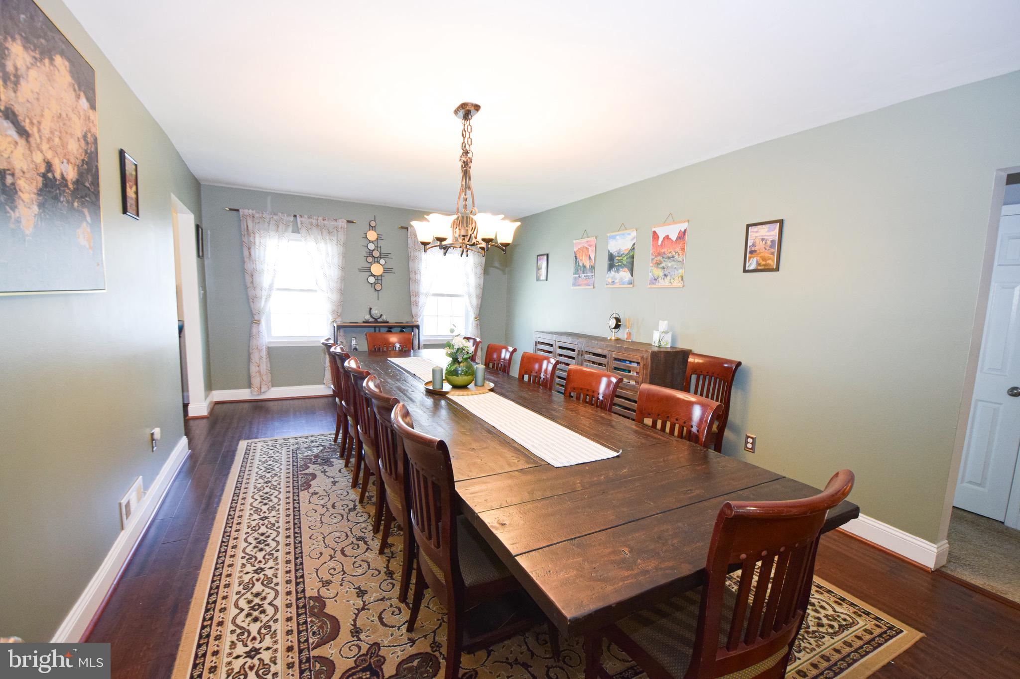 149 Post Road Aberdeen, MD 21001 - Photo 8 of 49 a view of a dining room with furniture and wooden floor