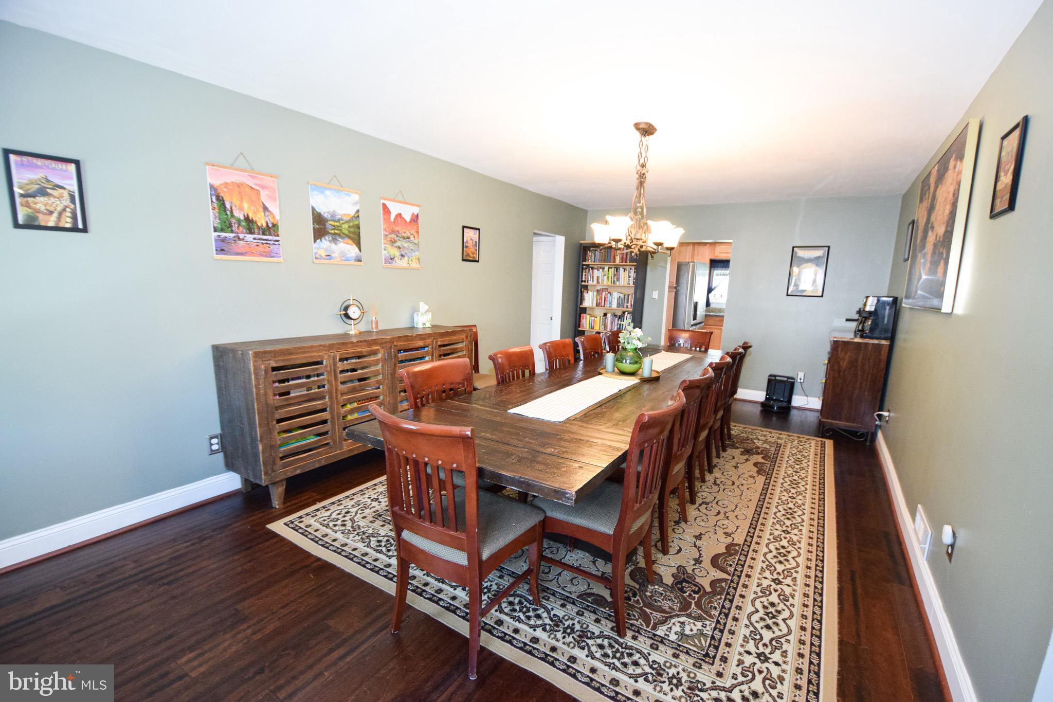 149 Post Road Aberdeen, MD 21001 - Photo 9 of 49 a view of a dining room with furniture window and wooden floor