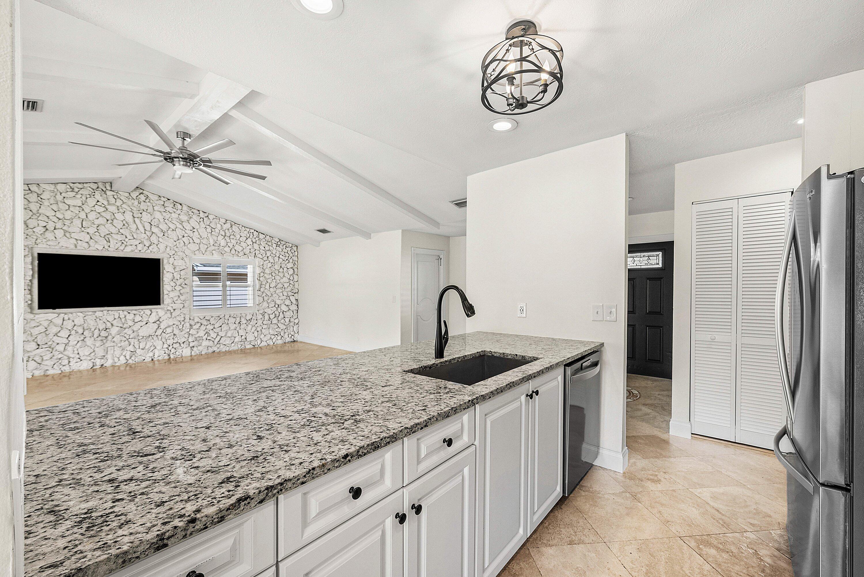 1508 Cormorant Road Delray Beach, FL 33444 - Photo 12 of 54 Kitchen w expansive counter & cabinets