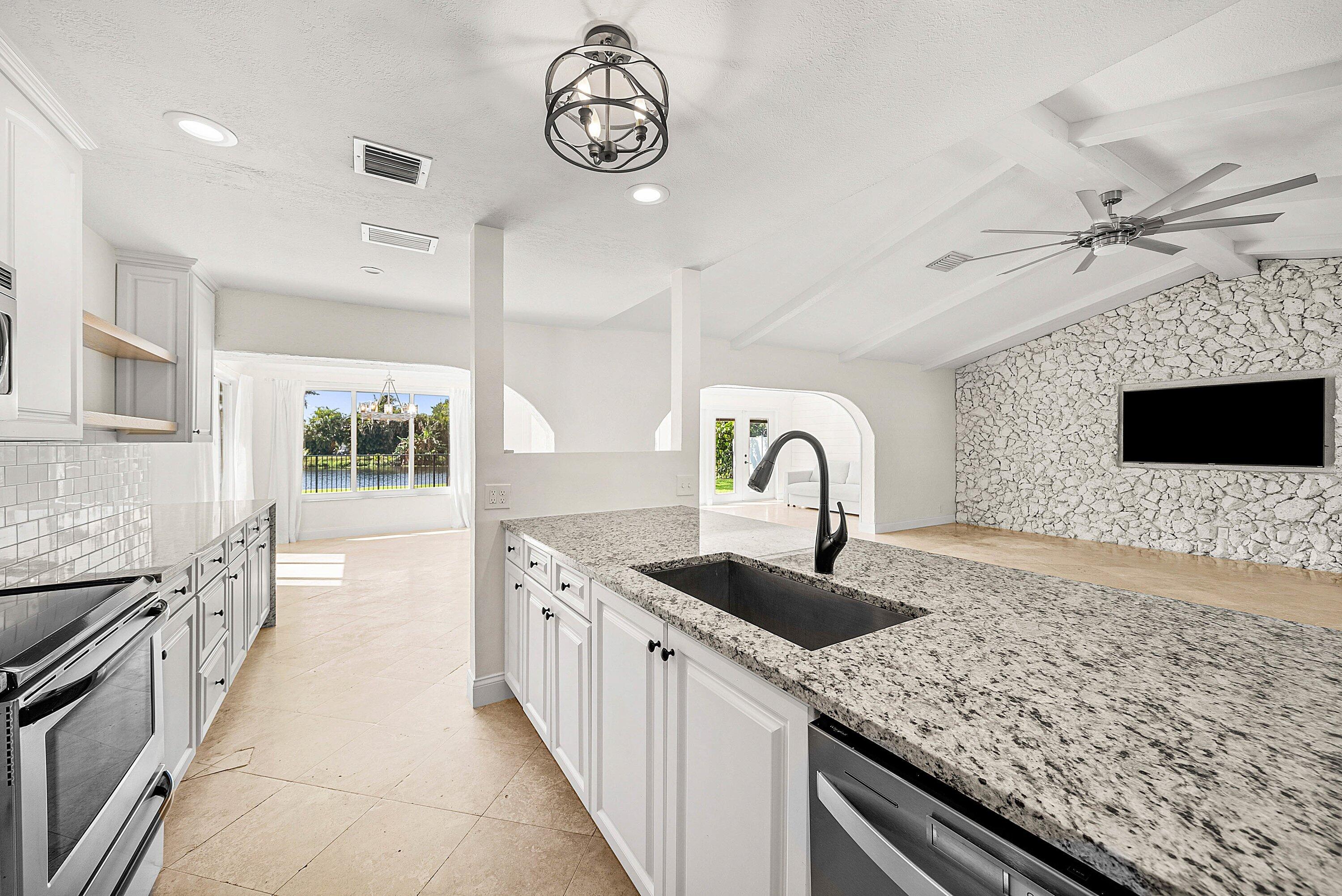 1508 Cormorant Road Delray Beach, FL 33444 - Photo 13 of 54 Kitchen w expansive counter & cabinets