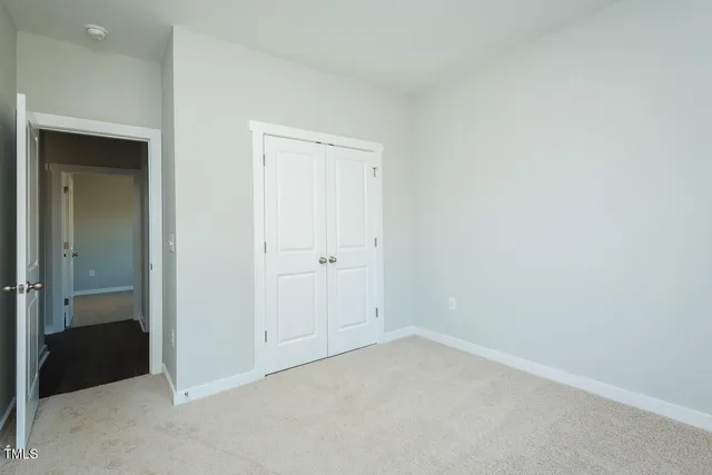 an empty room with closet