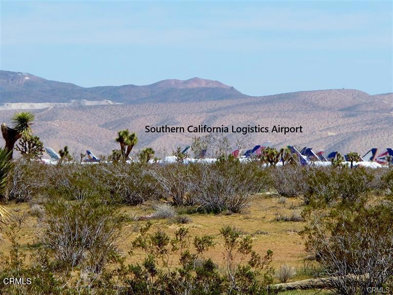 32 Pearmain Street Adelanto, CA 92301 - Photo 10 of 23 a view of a mountain with an outdoor space