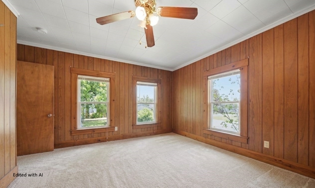 436 Franklin Road Fitchburg, MA 01420 - Photo 33 of 41 an empty room with windows and fan