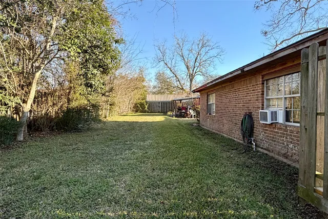 a view of backyard of house