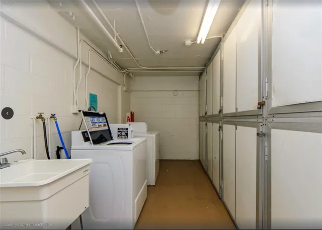 an aerial view of a house with a lake view