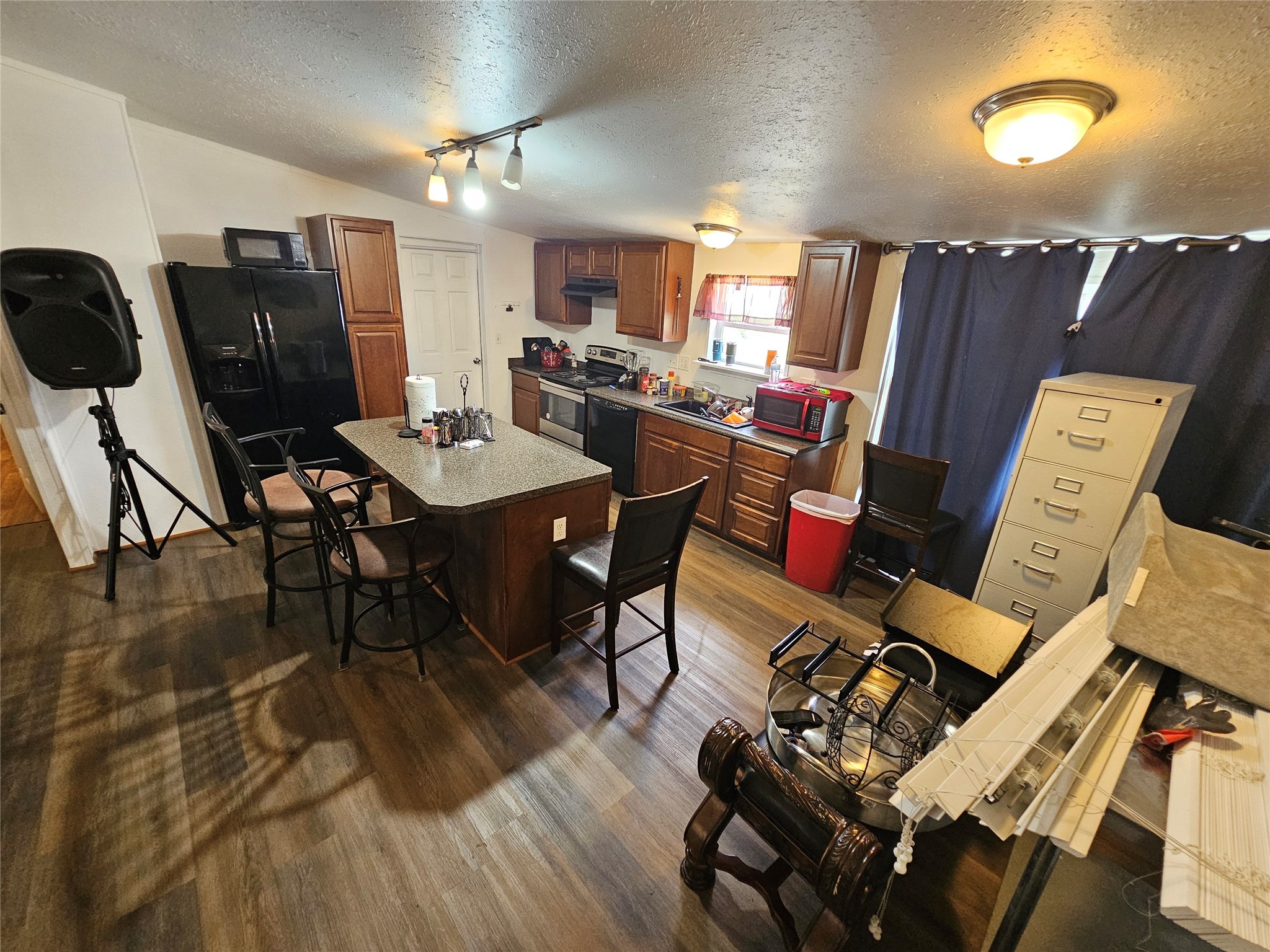 15519 Schank Road Conroe, TX 77306 - Photo 9 of 15 a view of a dining room with furniture