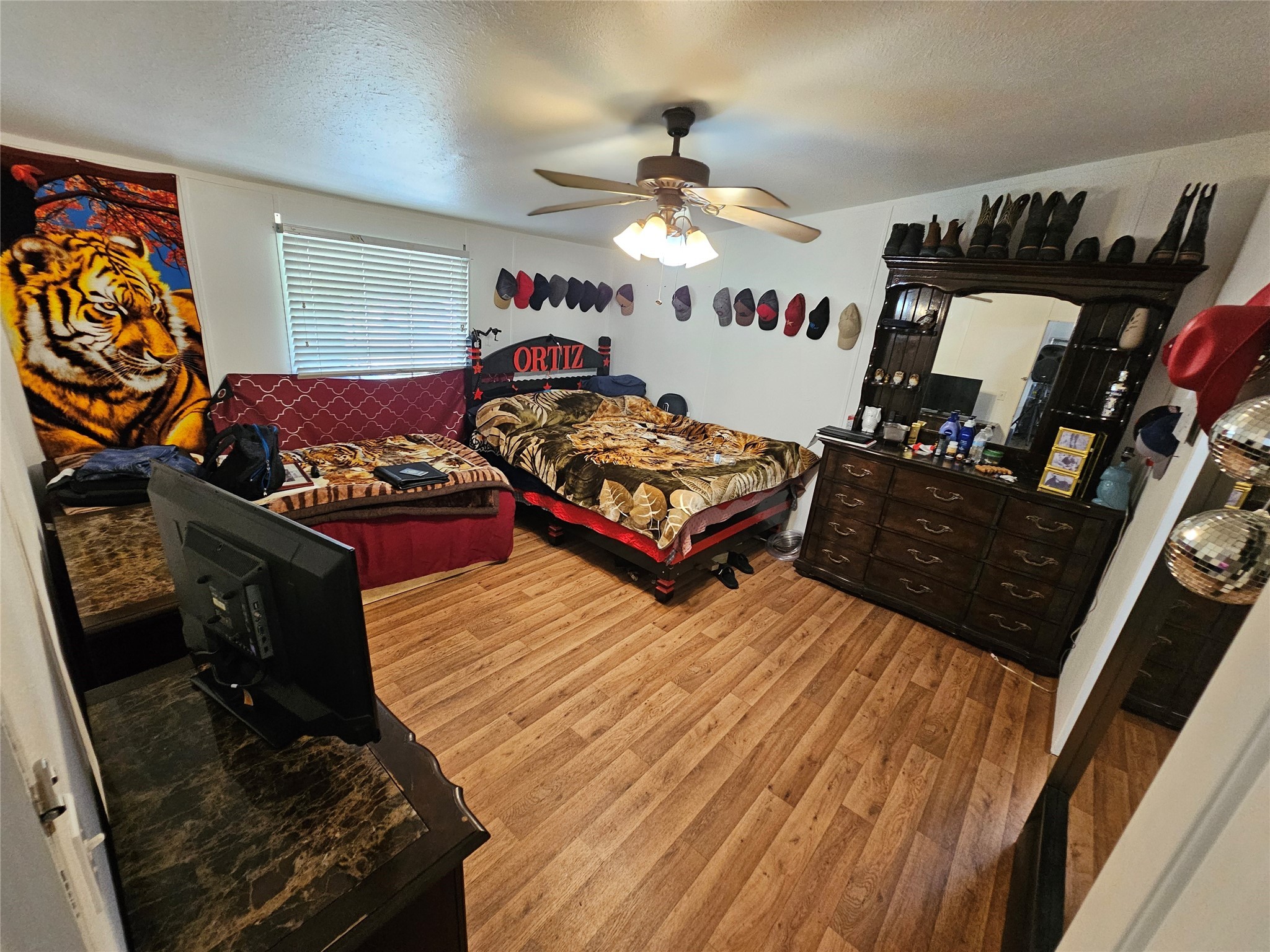 15519 Schank Road Conroe, TX 77306 - Photo 10 of 15 a bedroom with bed and window