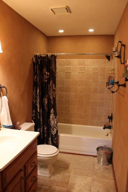1309 Callaway Road Rocky Mount, VA 24151 - Photo 12 of 25 a bathroom with a toilet a sink and bathtub