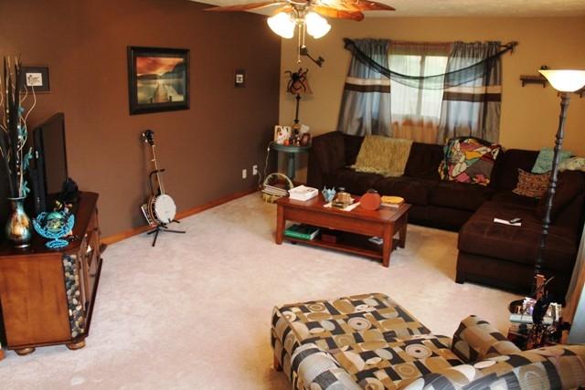 1309 Callaway Road Rocky Mount, VA 24151 - Photo 5 of 25 a living room with furniture and a flat screen tv