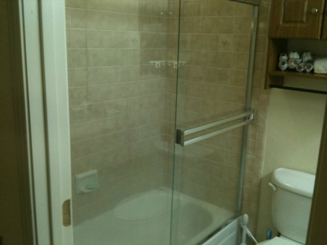 1664 Davis Street Ripon, CA 95366 - Photo 6 of 8 a bathroom with a shower