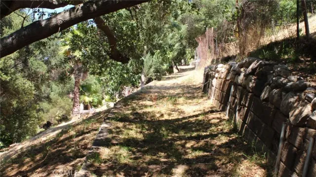 a view of a yard covered with snow