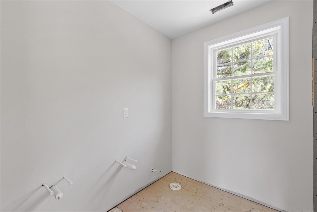 22 Benoit Avenue Pelham, NH 03076 - Photo 18 of 42 an empty room with a window