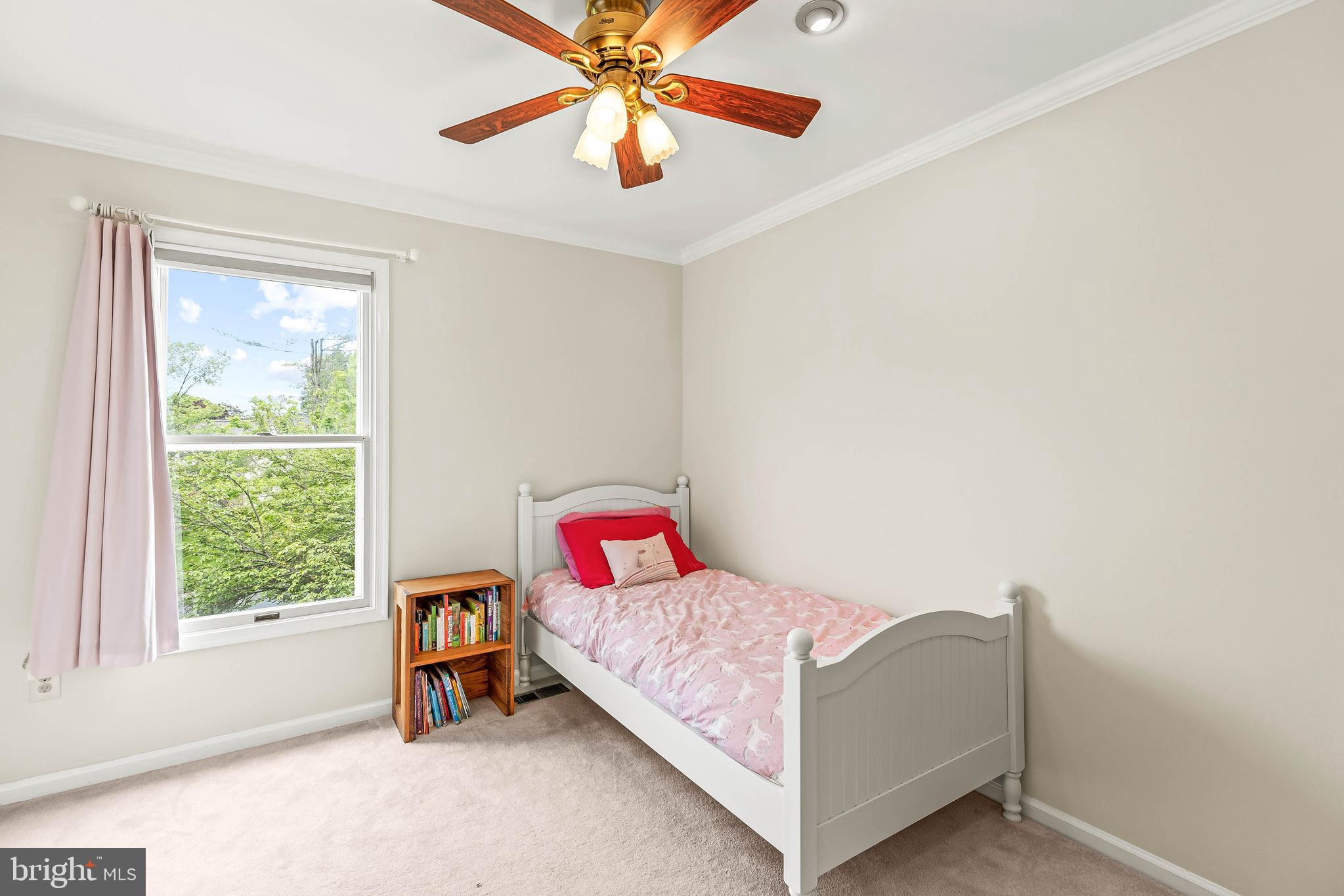 1868 Middlebridge Drive Silver Spring, MD 20906 - Photo 35 of 50 a bedroom with a bed and a window