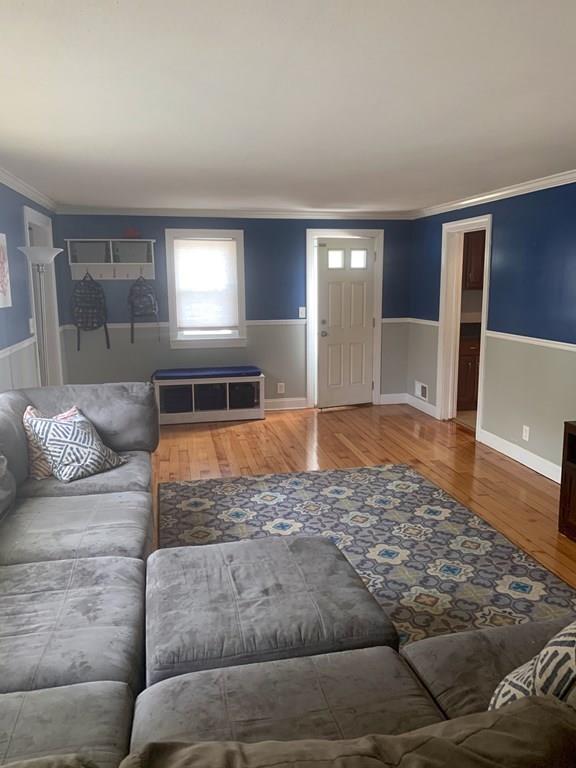 239 Windemere Street Springfield, MA 01104 - Photo 14 of 32 a living room with a couch and a window