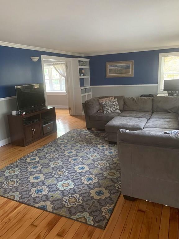 239 Windemere Street Springfield, MA 01104 - Photo 16 of 32 a living room with furniture and a flat screen tv