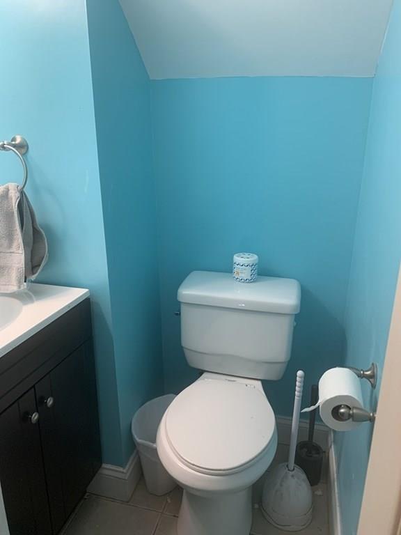 239 Windemere Street Springfield, MA 01104 - Photo 29 of 32 a white toilet sitting next to a bathroom sink