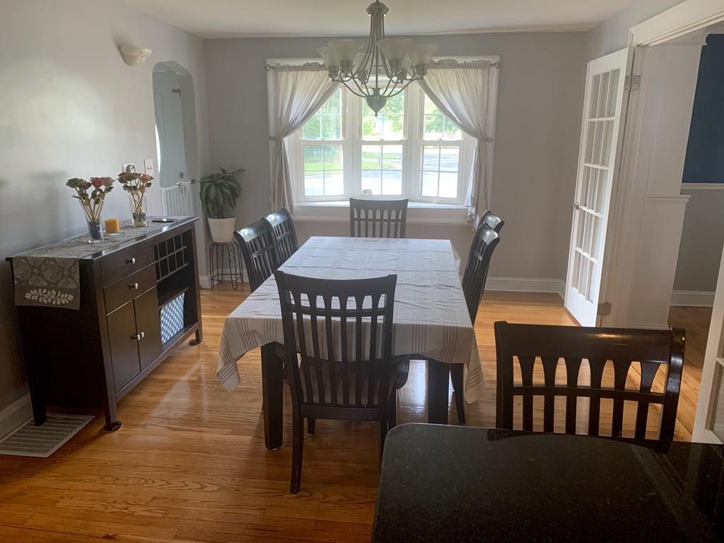 239 Windemere Street Springfield, MA 01104 - Photo 9 of 32 a view of a dining room with furniture window and outside view