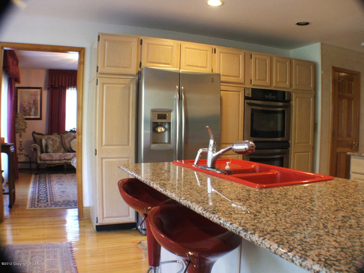 488 Rinker Road Stroudsburg, PA 18360 - Photo 16 of 54 a kitchen with granite countertop a refrigerator a stove and a sink
