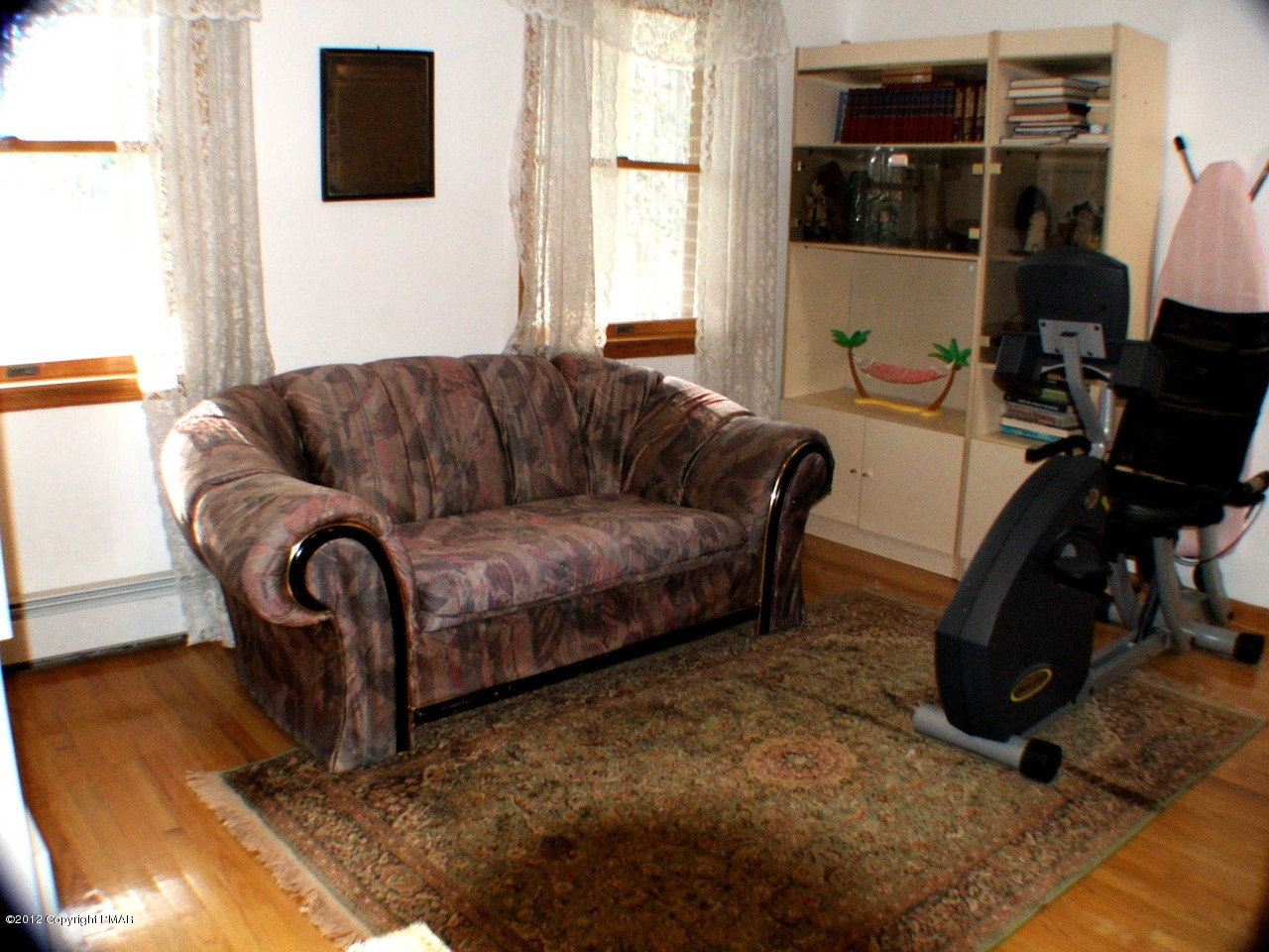 488 Rinker Road Stroudsburg, PA 18360 - Photo 23 of 54 a living room with furniture a flat screen tv and a window