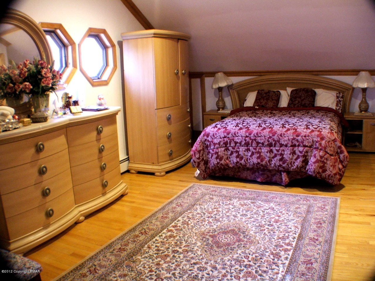 488 Rinker Road Stroudsburg, PA 18360 - Photo 40 of 54 a bedroom with large bed and a dresser