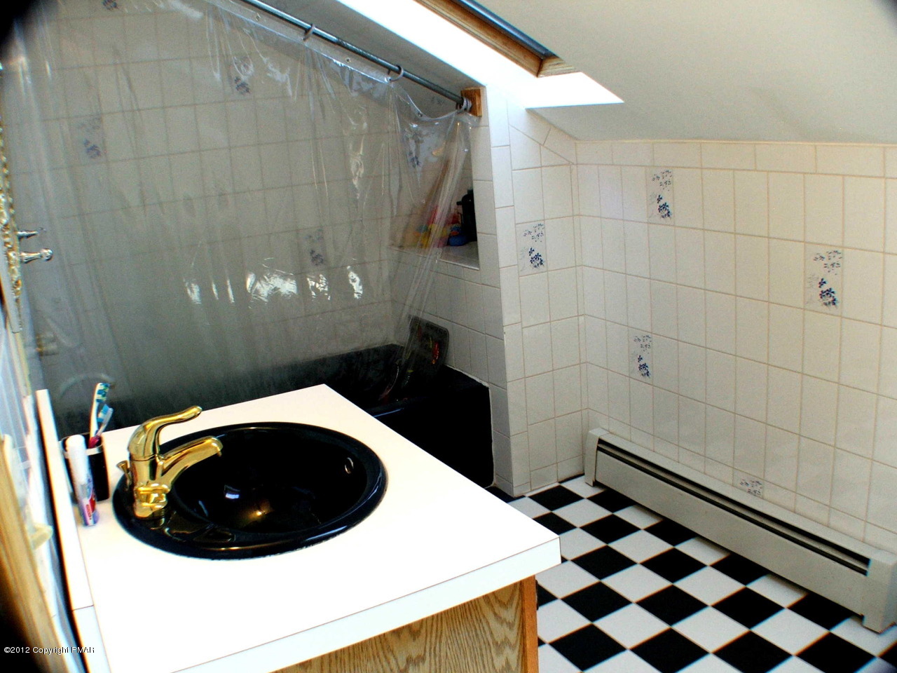 488 Rinker Road Stroudsburg, PA 18360 - Photo 43 of 54 a bathroom with a sink and a toilet