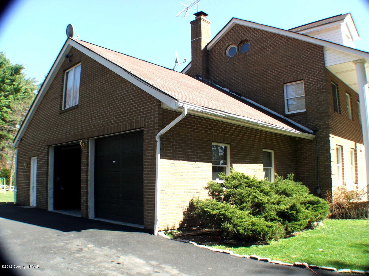 488 Rinker Road Stroudsburg, PA 18360 - Photo 54 of 54 a front view of a house with a yard
