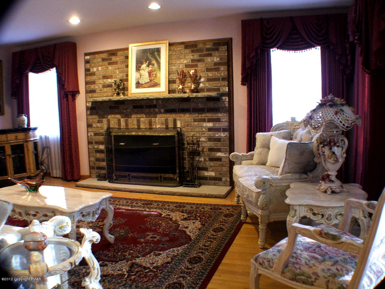 488 Rinker Road Stroudsburg, PA 18360 - Photo 6 of 54 a living room with furniture and a fireplace