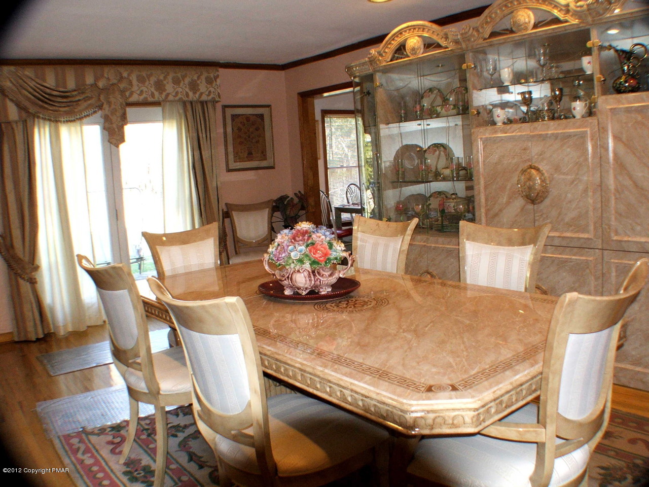 488 Rinker Road Stroudsburg, PA 18360 - Photo 10 of 54 a dining room with furniture window and wooden floor