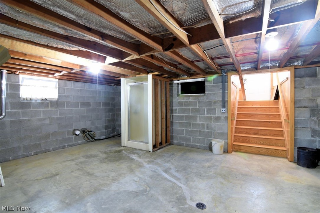 15227 Leroy Road Thompson, OH 44086 - Photo 41 of 50 Shower is not connected to the septic. Walkup access to exterior of the home.