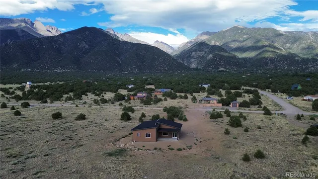 a house view with a backyard space