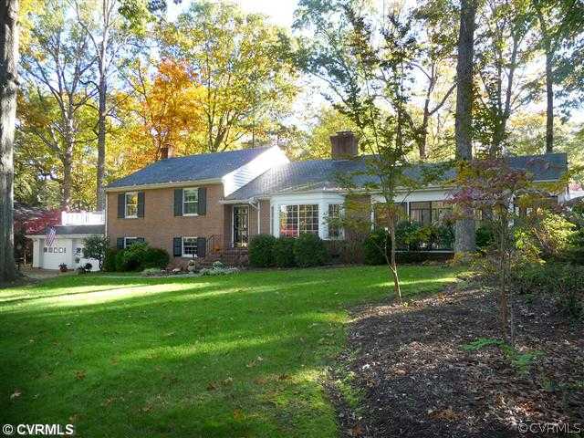 4407 Wakefield Road Richmond, VA 23225 - Photo 1 of 11 a front view of a house with a yard