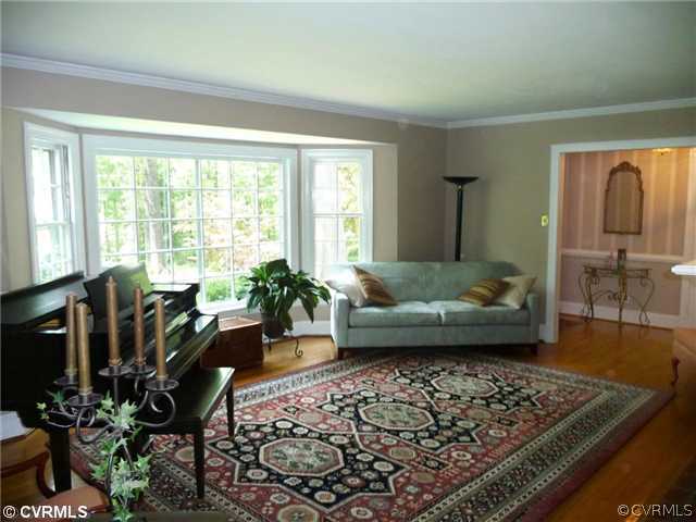 4407 Wakefield Road Richmond, VA 23225 - Photo 3 of 11 a living room with furniture and a rug
