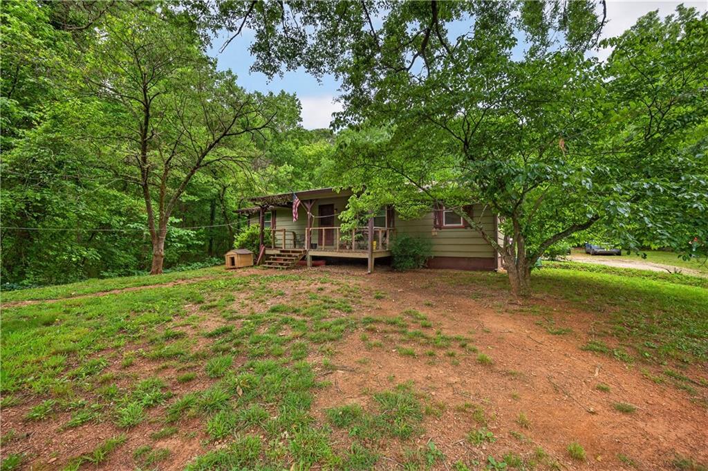 4399 Highway 411 Rydal, GA 30171 - Photo 23 of 37 a front view of a house with garden