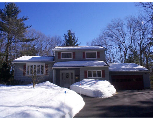 32 Long Meadow Road Chelmsford, MA 01824 - Photo 1 of 1 a front view of a house with a yard