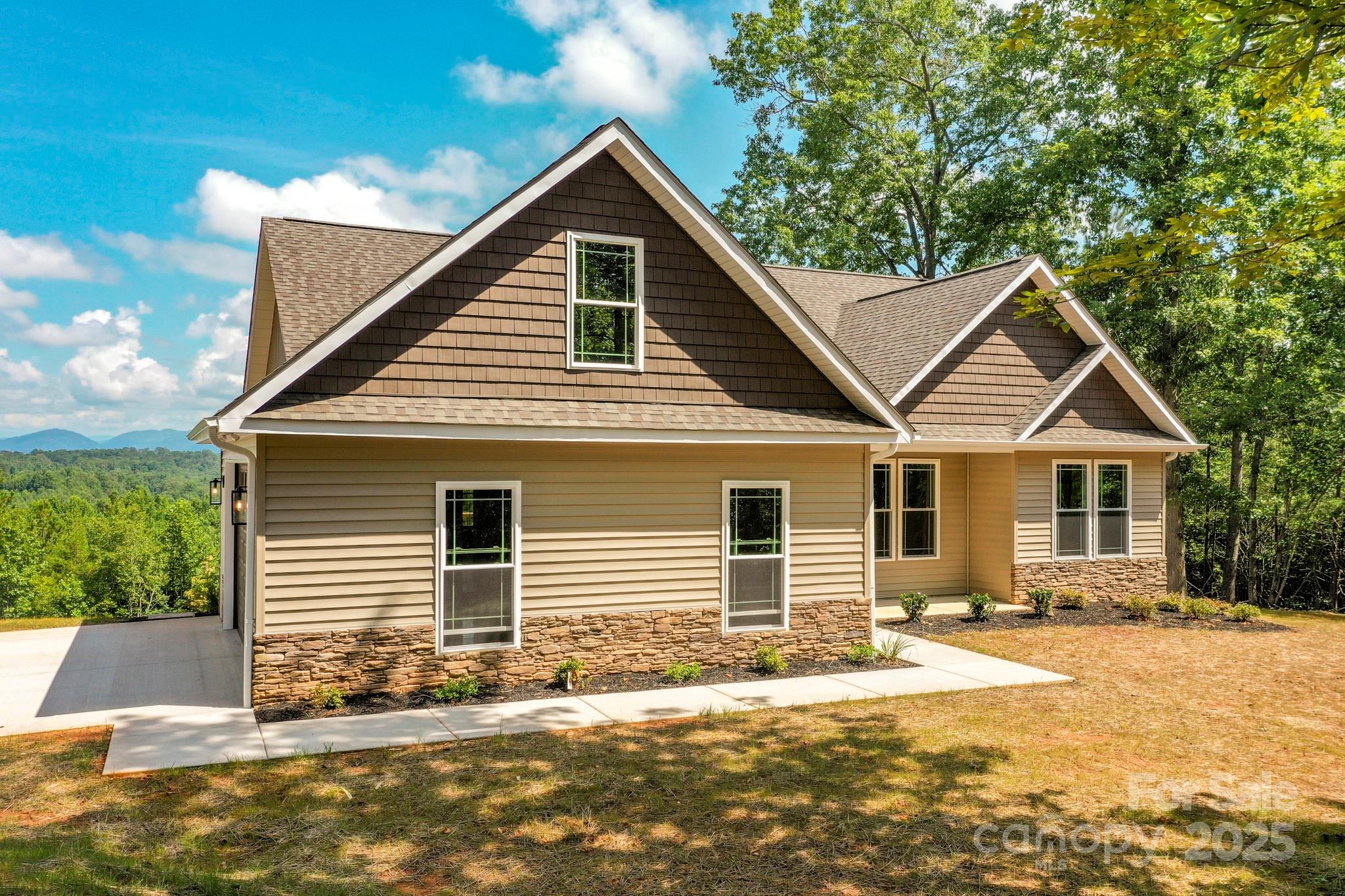 160 Northridge Drive Rutherfordton, NC 28139 - Photo 1 of 37 a front view of a house with a yard