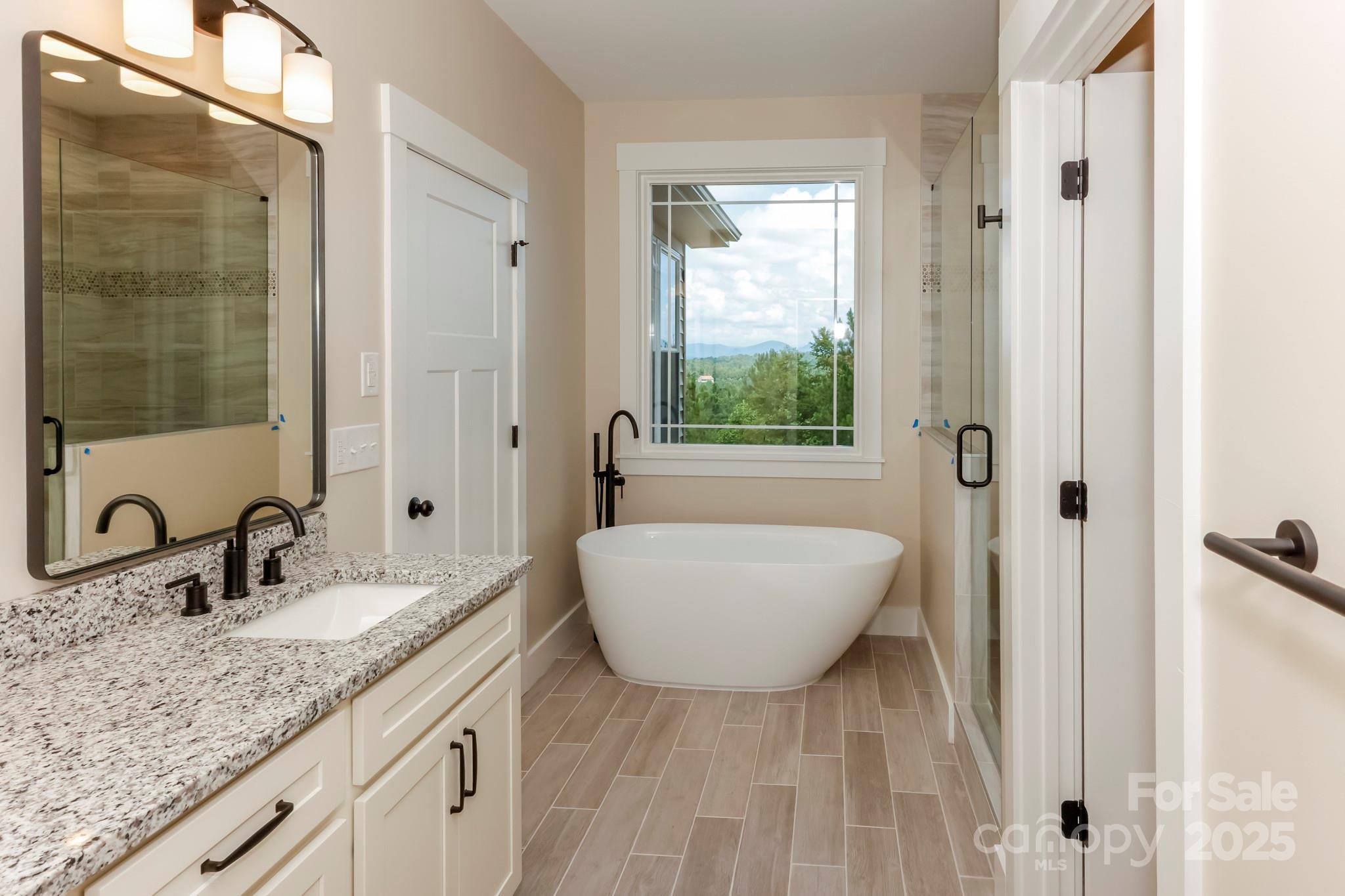 160 Northridge Drive Rutherfordton, NC 28139 - Photo 14 of 37 a bathroom with a granite countertop sink and a mirror
