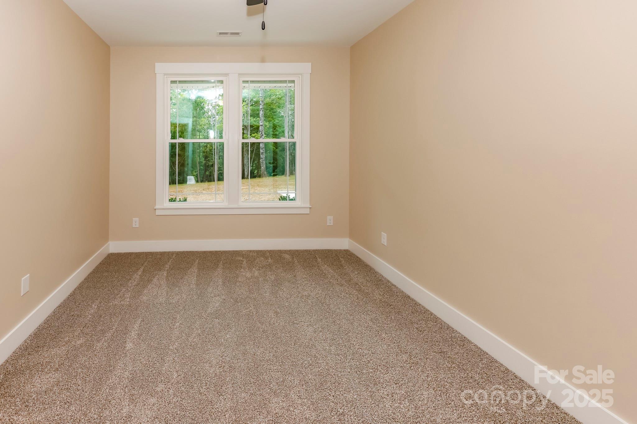 160 Northridge Drive Rutherfordton, NC 28139 - Photo 17 of 37 an empty room with a window