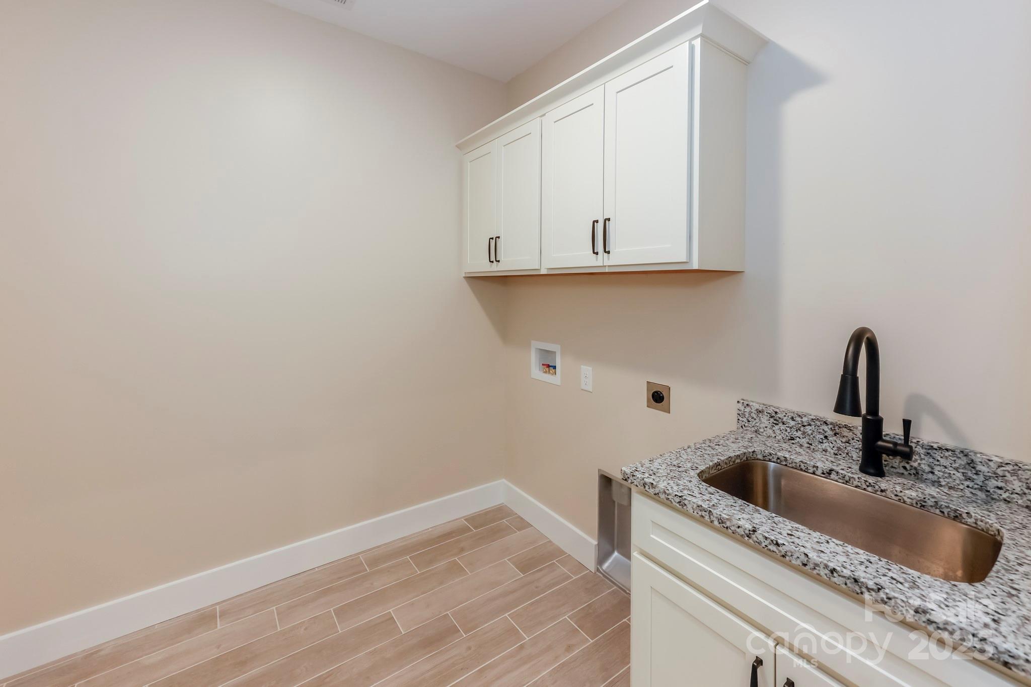 160 Northridge Drive Rutherfordton, NC 28139 - Photo 21 of 37 a kitchen with a sink and cabinets
