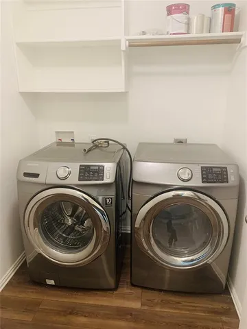 a utility room with dryer and washer