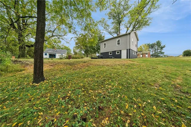 a house view with a garden space