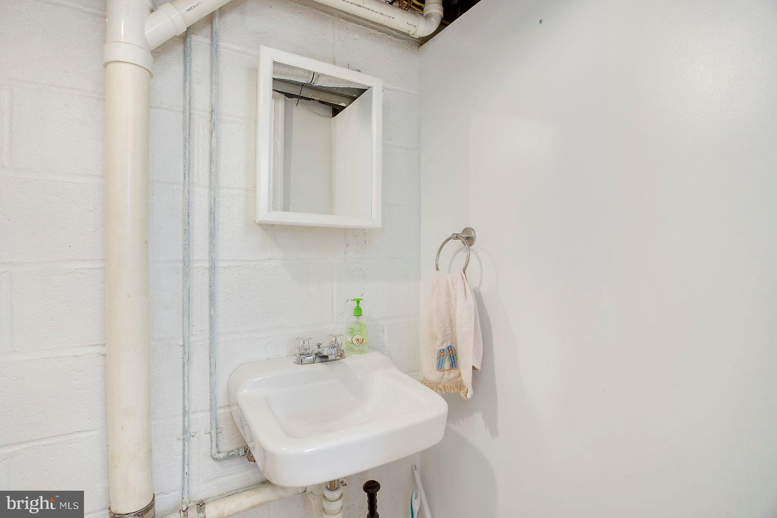 7811 Rockbourne Road Baltimore, MD 21222 - Photo 28 of 35 Half bath in basement