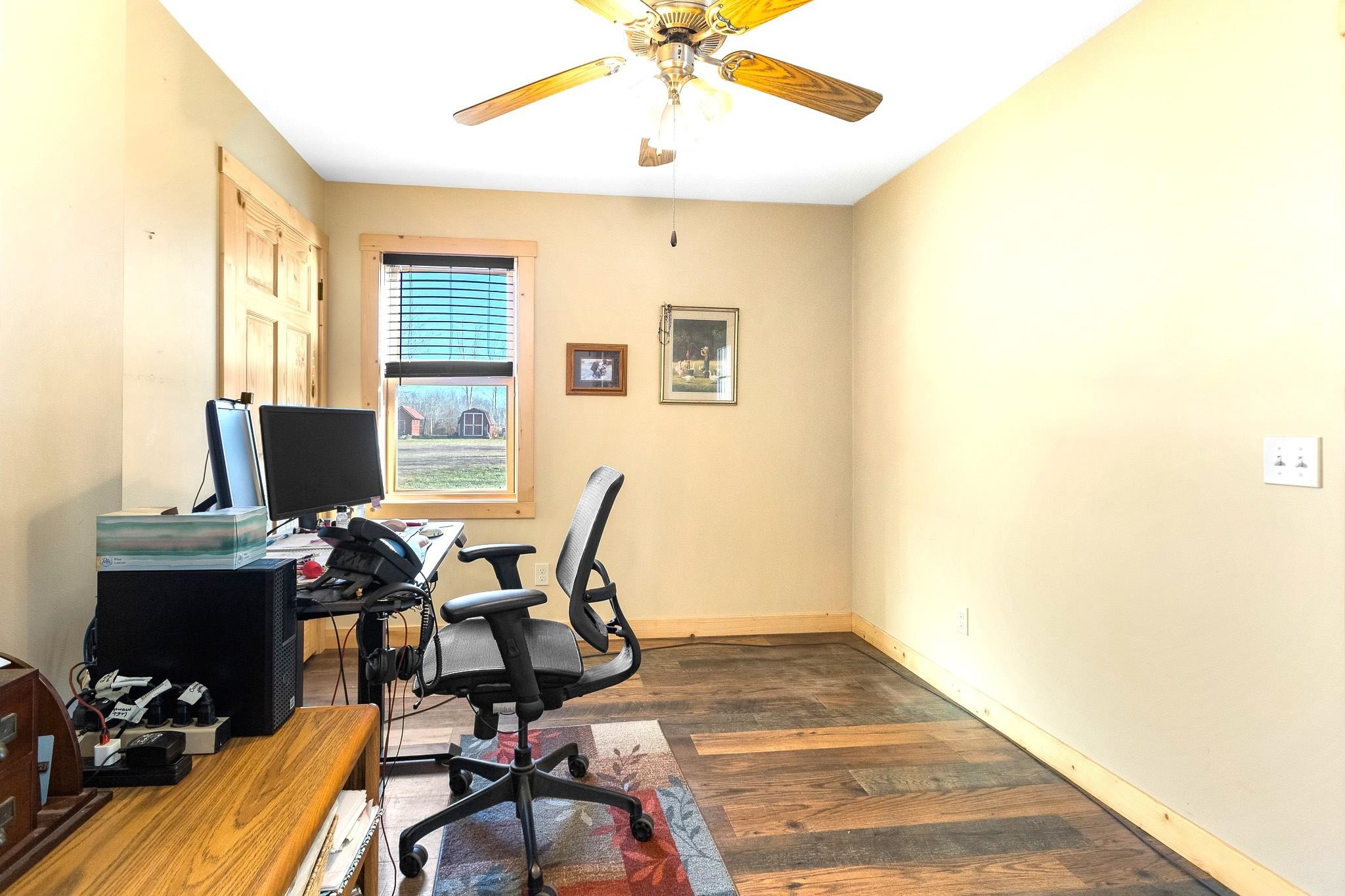 6014 Brown Road Kettle River, MN 55757 - Photo 22 of 54 Office space featuring dark wood finished floors and ceiling fan