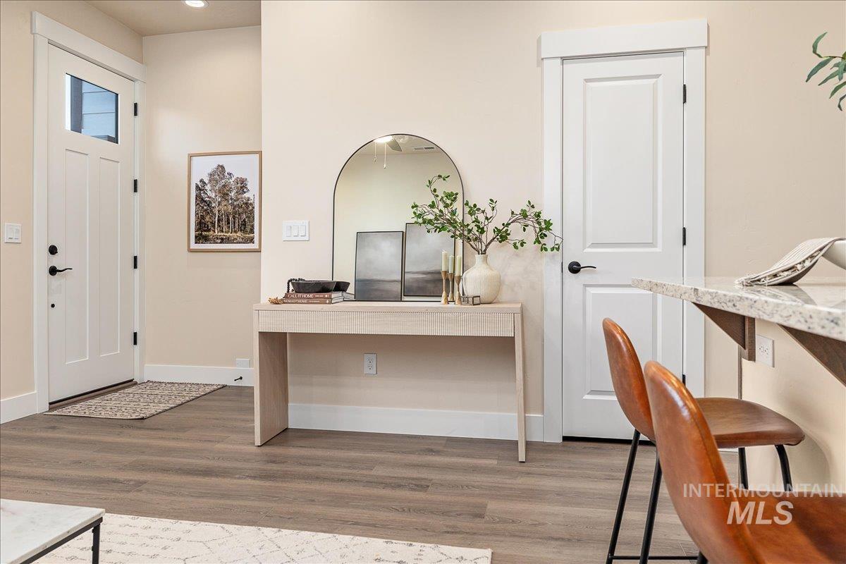 1439 North Bluffs Ridge Lane Boise, ID 83704 - Photo 19 of 47 Entrance foyer with wood finished floors and baseboards