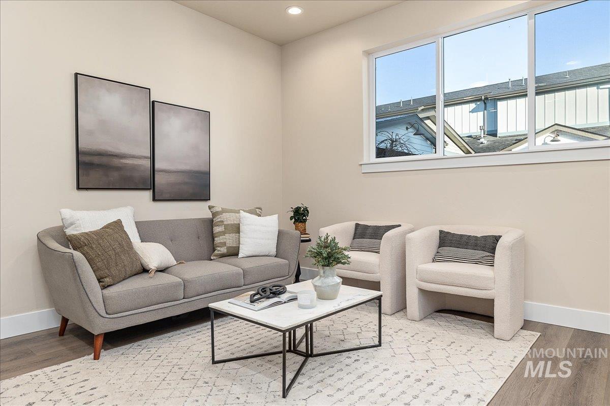 1439 North Bluffs Ridge Lane Boise, ID 83704 - Photo 21 of 47 Living room with wood finished floors and recessed lighting