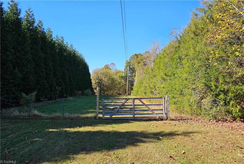 460 Mr Henry Road Mocksville, NC 27028 - Photo 2 of 12 Gate, entrance, easement fr/Mr. Henry Rd