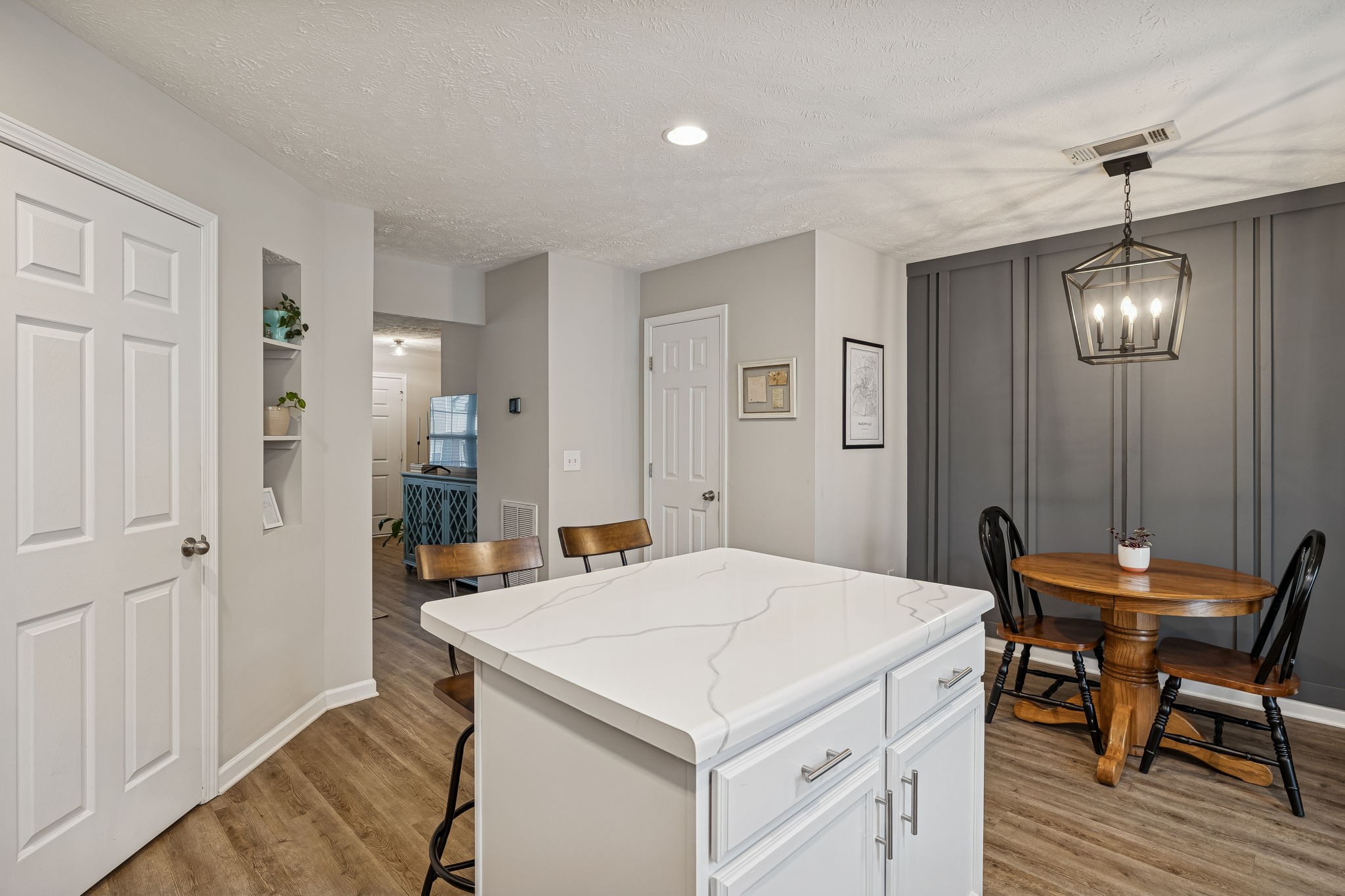 1834 Shaylin Loop Antioch, TN 37013 - Photo 11 of 28 a view of kitchen island with furniture and wooden floor